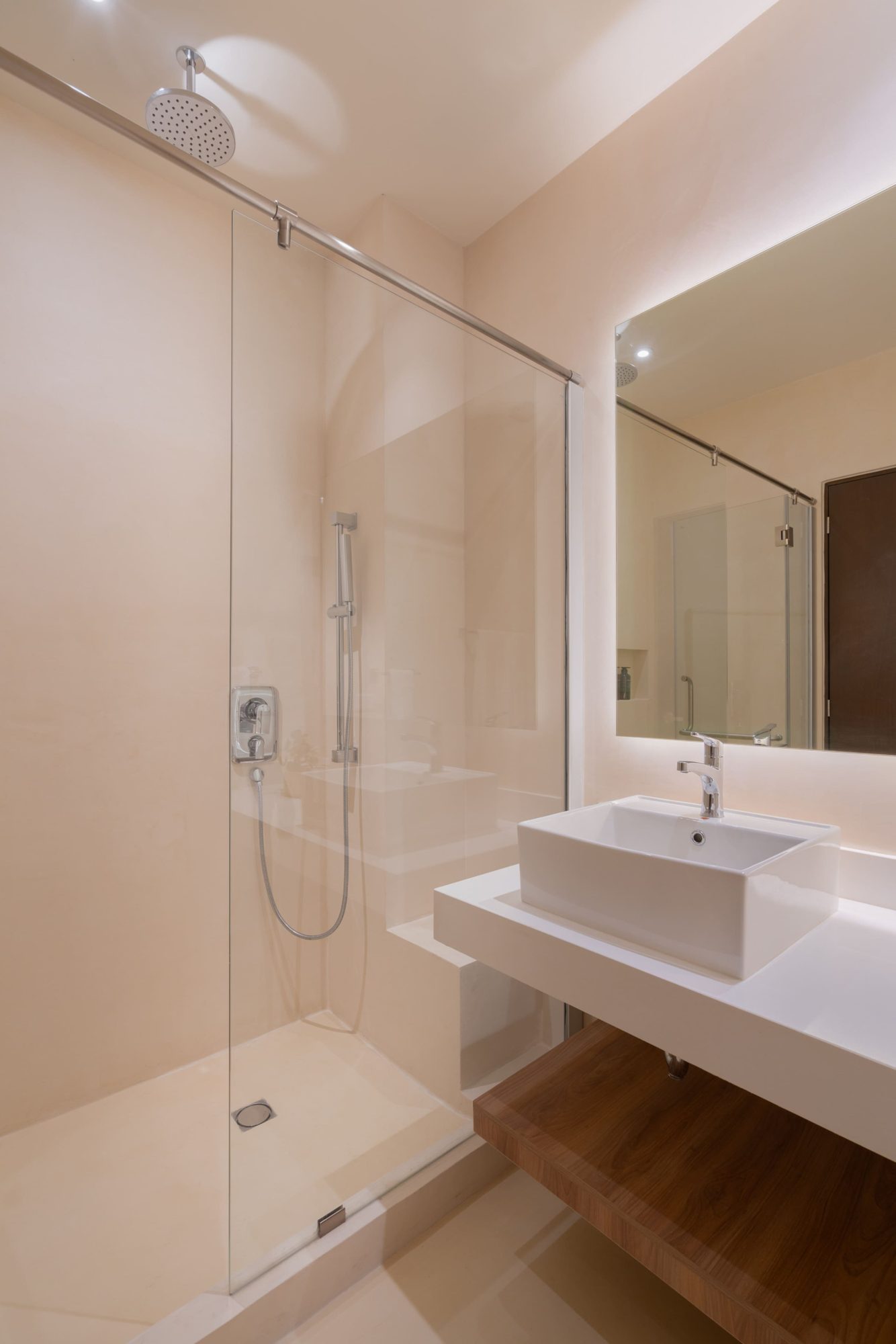 Glass shower and vanity in the second bathroom