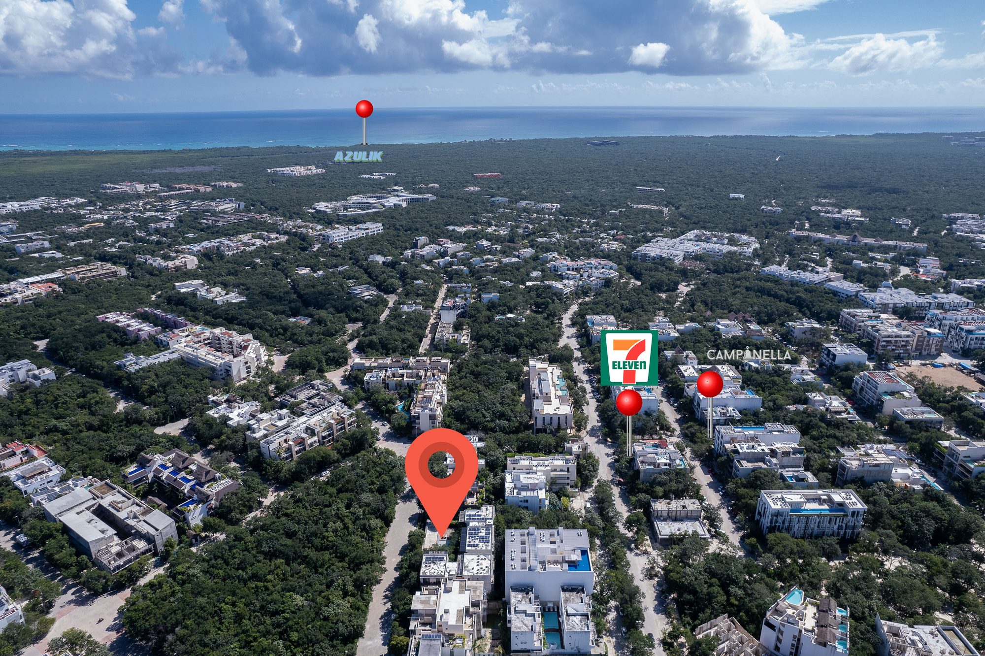 Aerial view of the neighborhood with the property marked near local shops