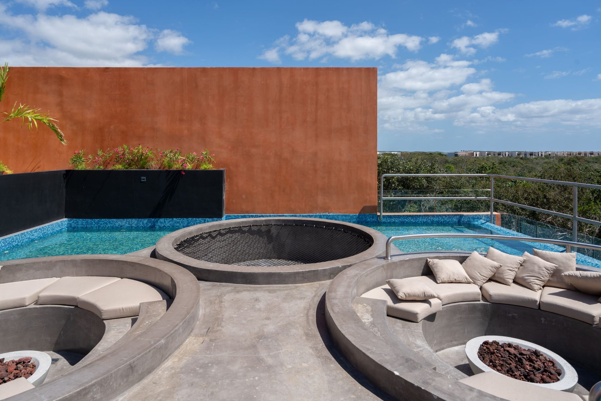 Rooftop sunken lounge seating with fire pits