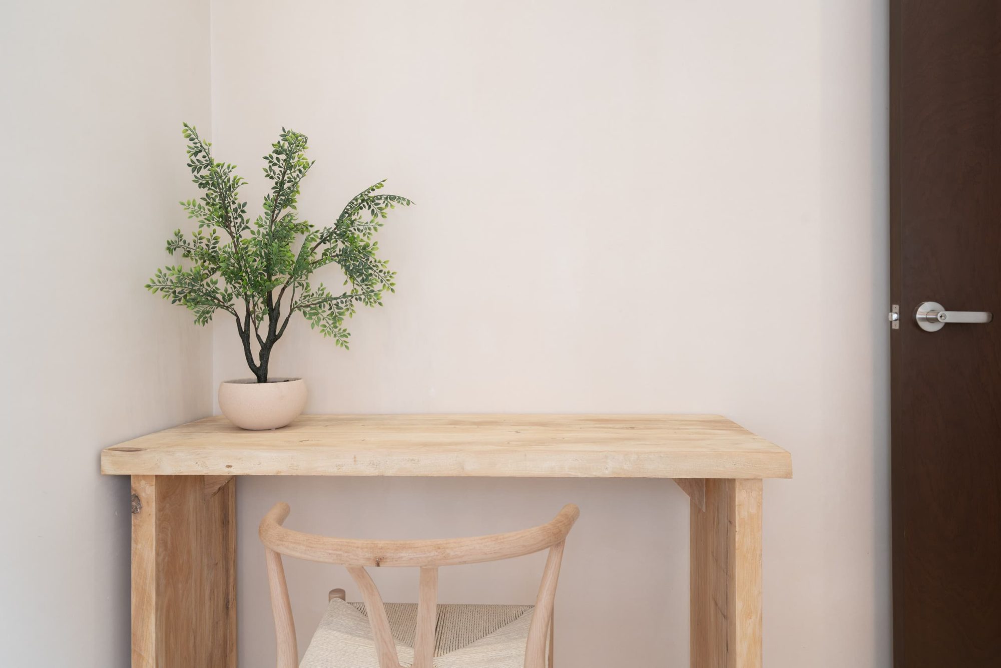Dedicated workspace with a wood desk and chair