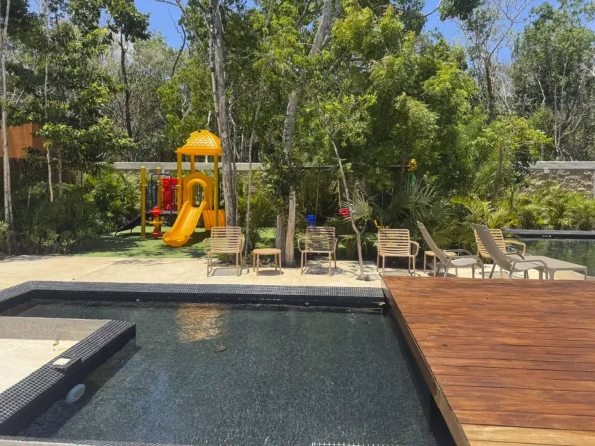 Children's pool beside a playground
