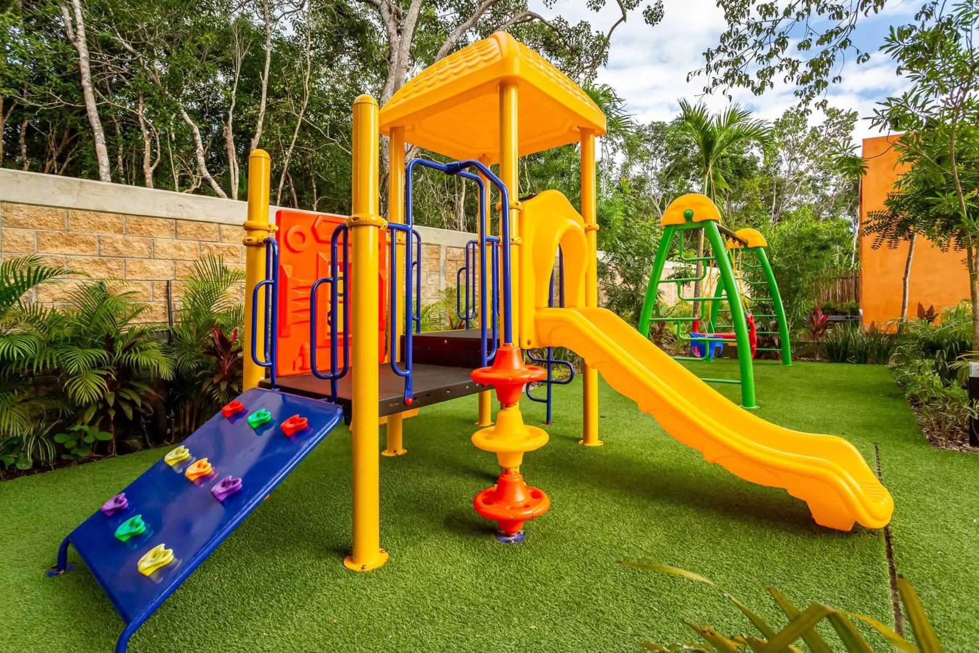 Playground with slide and climbing wall